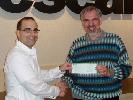 John Sangiovanni of Microsoft Research awards Brad Myers with a $80,000 grant in 2006.